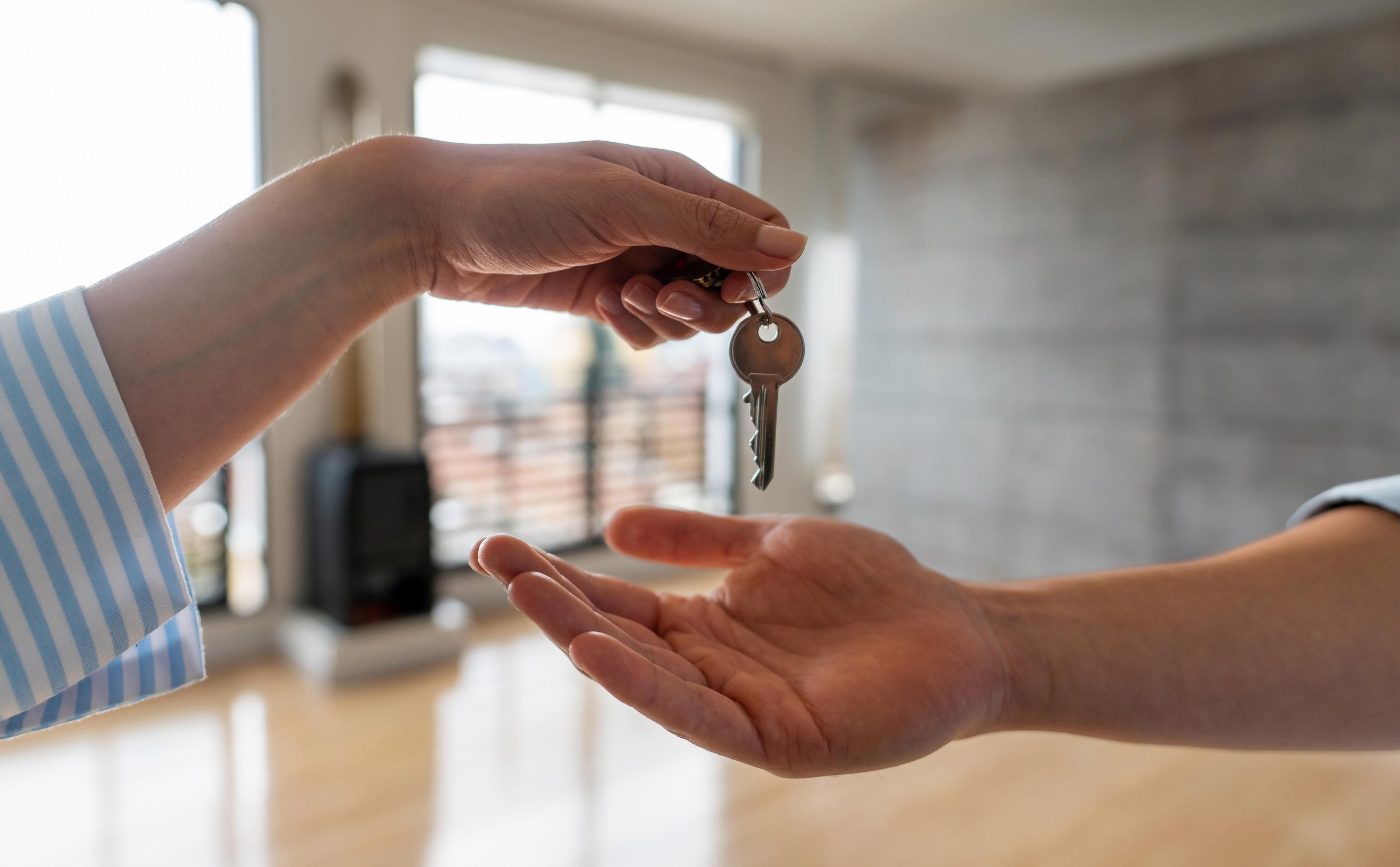 Handing over keys to a house